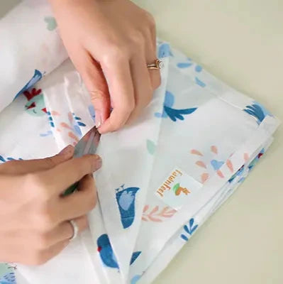 Cuddle up in Chirpy Bird Print Bamboo Swaddle