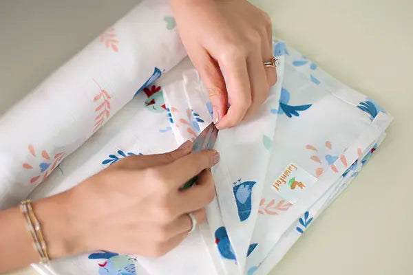 Cuddle up in Chirpy Bird Print Bamboo Swaddle