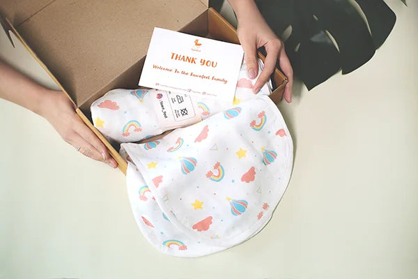 Combination of Rainbow Print Bamboo Swaddle And Curved Burp Cloth