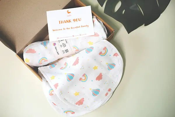 Combination of Rainbow Print Bamboo Swaddle And Curved Burp Cloth