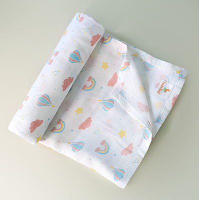 Cuddle up in Rainbow Print Bamboo Swaddle