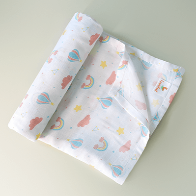 Cuddle up in Rainbow Print Bamboo Swaddle