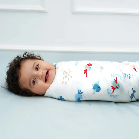 Cuddle up in Chirpy Bird Print Bamboo Swaddle