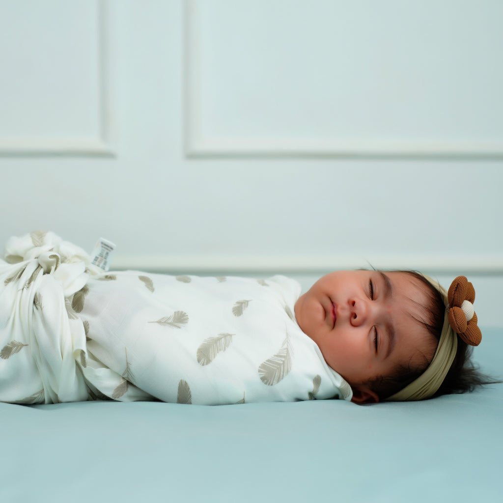 Cuddle up in Feather Print  Bamboo Swaddle