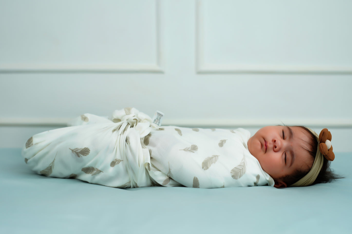 Cuddle up in Feather Print  Bamboo Swaddle