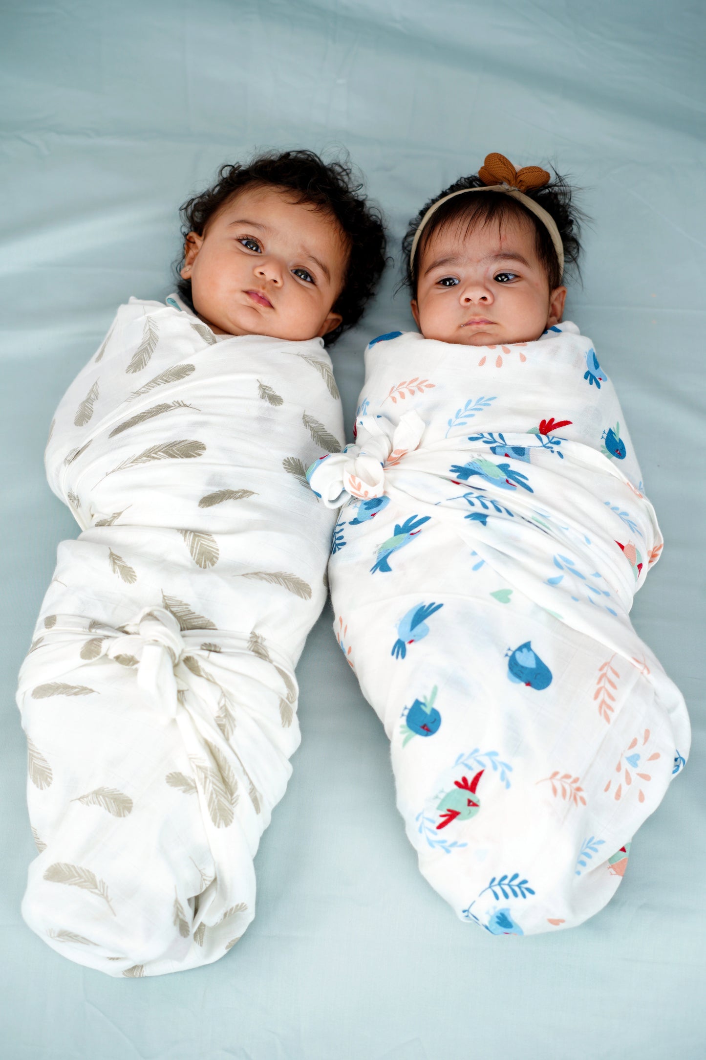 Cuddle up in Bamboo Chirpy Bird Print And Feather Print Bamboo Swaddle