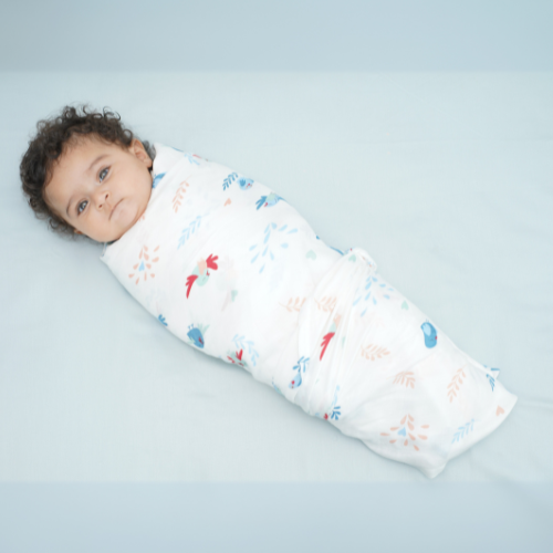 Cuddle up in Chirpy Bird Print Bamboo Swaddle