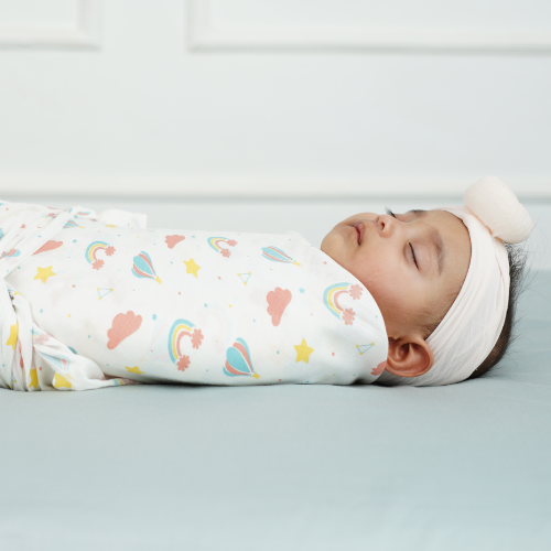 Cuddle up in Rainbow Print Bamboo Swaddle